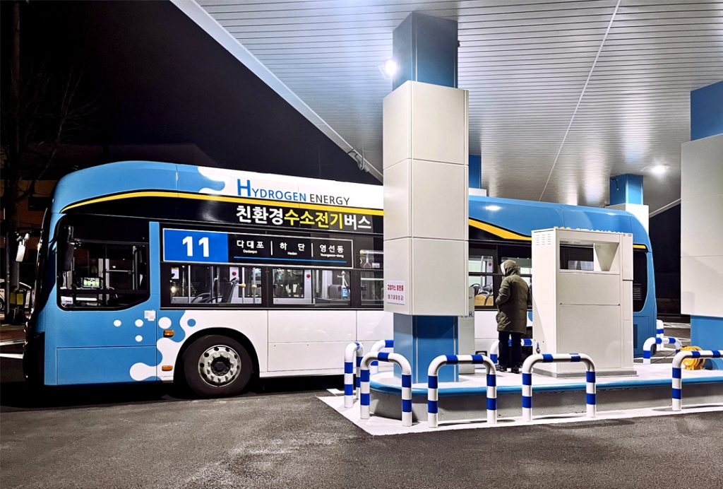 Nikkiso CE&IG hydrogen station with bus at night